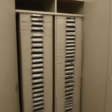 AI-generated art thumbnail for: Filing Unit Drawer Misalignment