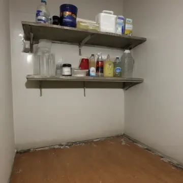 AI-generated art thumbnail for: Loose Bracket On Shelf Unit