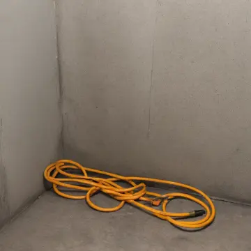 AI-generated art thumbnail for: Orange Cord Utility Closet