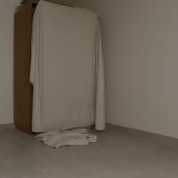 Mismatched sheet set in Utility linen closet. A routine sorting task interrupted by an object refusing its assigned location. Folded cotton linen