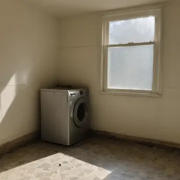 Overturned ceramic planter in Municipal laundry room corner. The morning reset is incomplete; one item resists placement. Grease film on tile grout