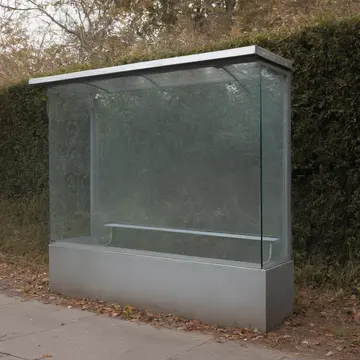 Station timetable display in Bus stop shelter corner. Waiting for an unseen, delayed connection. Dust film on plexiglass