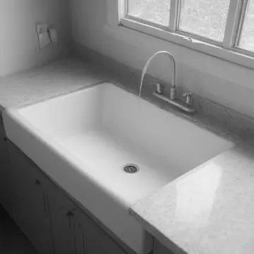 drain stopper assembly in kitchen utility sink. morning reset fails on one component. soap scum buildup near edge