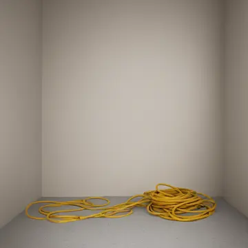 Spools and coiled cords in Utility closet corner. A careful inventory arrangement is being observed. Yellow electrical tape roll